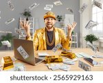 Happy successful excited funny man in golden suit sitting at desk with gold bar, building online business using laptop, throwing dollar bills making money rain celebrating success or win a lottery.