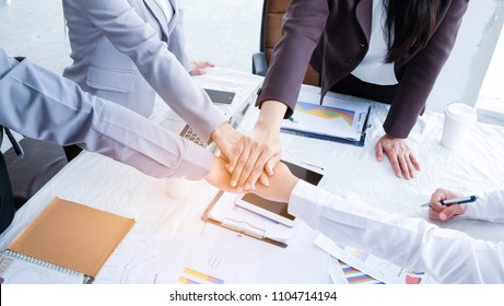 Happy successful gesturing business team at office.Successful entrepreneurs working in a team.business, planning, people and teamwork concept.