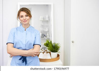Happy successful young woman cosmetologist on the background of the beauty office. Portrait of prosessional beautician - Shutterstock ID 1790196977