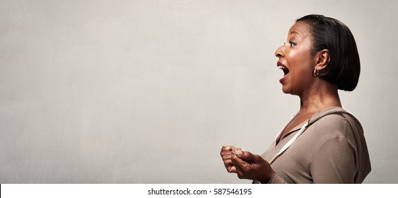 Happy Surprised Black Woman Profile