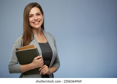 Happy teacher with book. isolated female portrait.