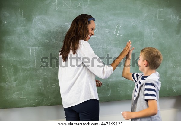 Happy Teacher School Boy Giving High Stock Photo 447169123 