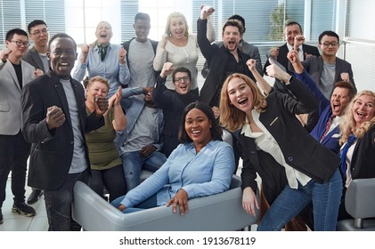 Happy Team Of Diverse Corporate Employees In The Office Lobby.