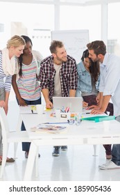 Happy Team Of Young Designers Having A Meeting In Creative Office