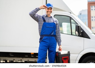 Happy Technician Service In Overall Near Van Or Truck