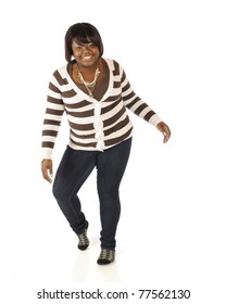 A Happy Teen Girl In Broad Stripes Attempting To Do The Moon Walk.  Isolated On White.