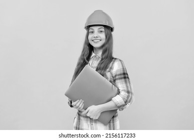 Happy Teen Girl In Helmet And Checkered Shirt Holding Laptop, Online Courses