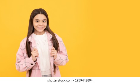 Happy Teen Girl In Pink Checkered Shirt. Smiling Hipster Kid Casual Style. Tween Child Wear Plaid Shirt. Chequered Flannel Jacket. Beauty And Fashion. Latest Trend. Copy Space. Street Autumn Fashion.