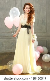 Happy Teen Girl In Prom Look With Helium Air Balloons