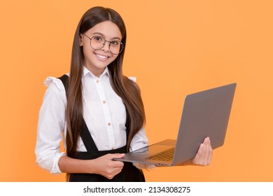 happy teen girl in school uniform and glasses study on laptop, casual learning