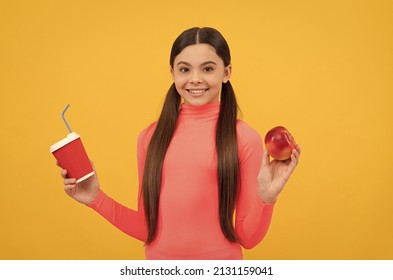 Happy Teen Girl With Takeaway Coffee Cup And Apple On Yellow Background, Lunch