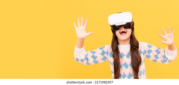 happy teen girl wear vr glasses using future technology for education in virtual reality, innovation. Banner of child girl with virtual reality vr headset, studio portrait with copy space.