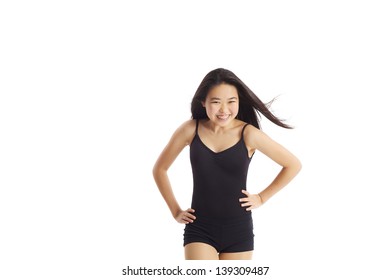 Happy Teen With Hair Flowing In Traditional Dance Leotard