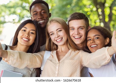 Happy Teen International Friends Taking Selfie While Walking In Summer Park, Happy Memories Concept