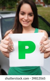 Happy Teen Showing Of P Plate