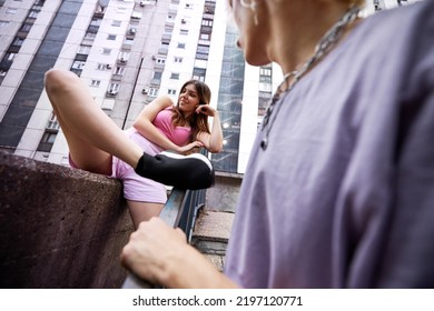 A Happy Teenage Couple Is Cuddling And Hugging In The Urban Part Of The Town.