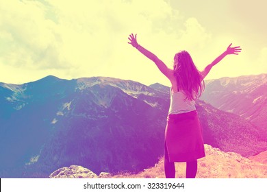 Happy Teenage Girl Feel Freedom In Mountains Scenery. Vintage Instagram Picture.