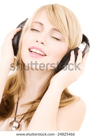 Similar – Blonde woman listening to music with her headphones