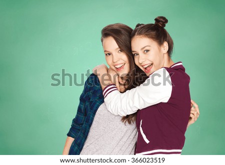 Similar – Image, Stock Photo Sisters, teenage girl and her younger sister pushing hay bale playing together outdoors in the countryside