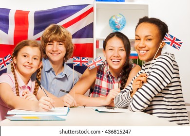 Happy teenage students at language courses