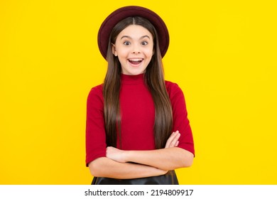 Happy Teenager Portrait. Smiling Girl. Confident Child Keep Arms Crossed, Isolated On Yellow Background, Empty Space. Little Caucasian Teenage Girl 12, 13, 14 Years Old Hold Hands Crossed.