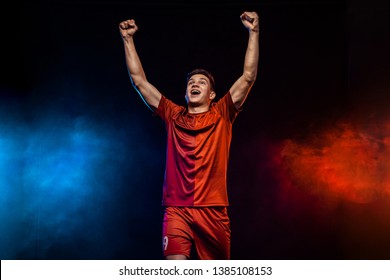 Happy Teenager - Soccer Player. Boy In Football Sportswear After Goal Celebrating. Sport Concept.