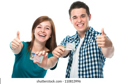 Happy Teens Showing Their Driving License