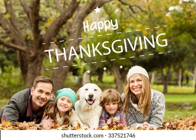 Happy Thanksgiving Against Young Family With A Dog
