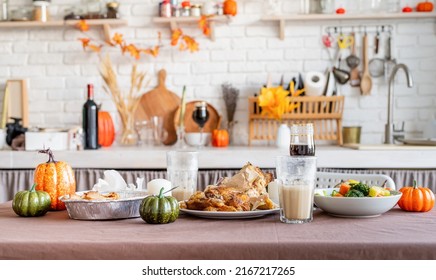 Happy Thanksgiving Day. Autumn feast. front view of thanksgiving table after feast, leftovers and dirty dishes. Cleaninf after feast - Shutterstock ID 2167217265