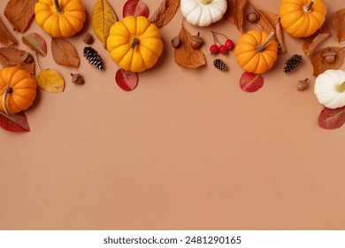 Happy Thanksgiving holiday background from autumn foliage, pumpkins and fall decorations top view.  
 - Powered by Shutterstock