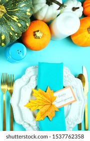 Happy Thanksgiving Setting Modern Elegant Blue Orange And White Themed Table With Pumpkins Centerpiece Overhead Flat Lay.