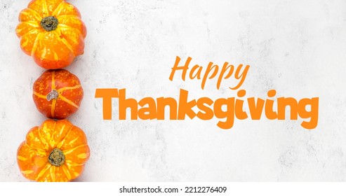 Happy Thanskgiving Text With Yellow And Orange Pumpkins On Left Side Against White Background. Template.Copyspace Banner