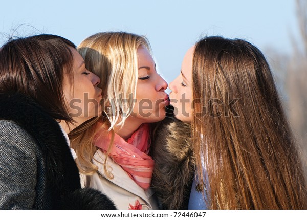 Happy Three Beautiful Young Women Kissing Stock Phot