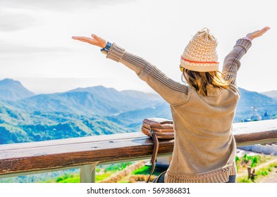 Happy time woman relax with nature  in the morning time. - Shutterstock ID 569386831