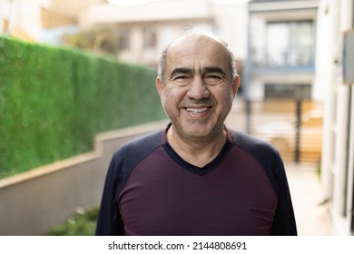 Happy and tired middle eastern man looking at the camera selective focus outdoor real people portrait - Shutterstock ID 2144808691