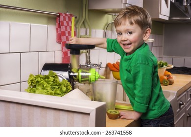 Happy Toddler Making Green Juice