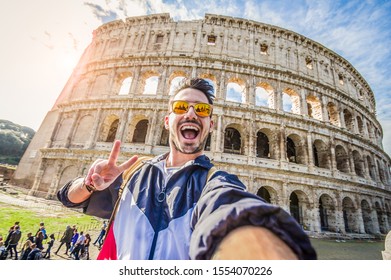 Happy Tourist Taking A Selfie At The Colosseum In Rome