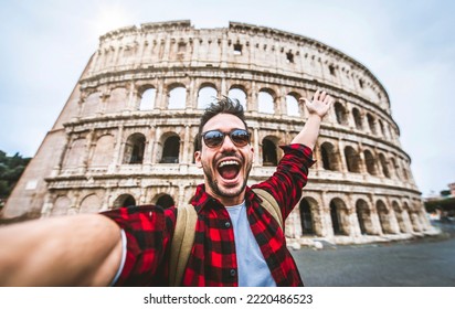 Happy Tourist Visiting Colosseum In Rome, Italy - Young Man Taking Selfie In Front Of Famous Italian Landmark - Travel And Holidays Concept