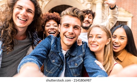 Happy Tourists Group Taking Selfie Photo Walking In European City Street - Multiracial Young People Smiling Together At Camera Outside - University Students Enjoying Day Out In College Campus