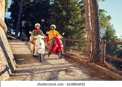 Happy tourists man and girl traveling on motorcycle and having fun. - Powered by Shutterstock