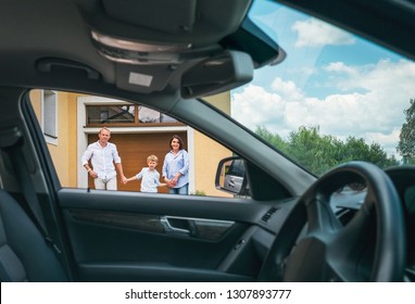 Happy Traditional Family Near Their House Portrait Who Bought New Car. Inside Car View.