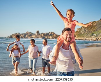 Happy, Travel And Love With Big Family At Beach For Colombia Holiday For Summer, Relax And Support. Sunset, Nature And Smile With Parents, Kids And Grandparents Walking By The Sea For Vacation