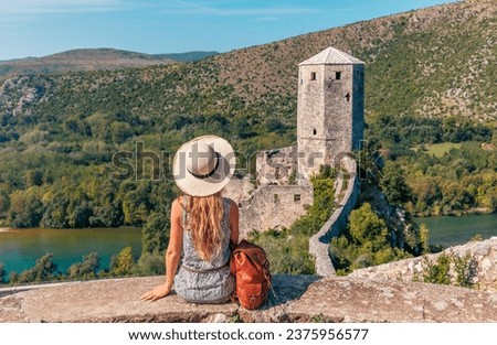Happy traveler woman in Bosnia Herzegovina- Travel, tour tourism,vacation destination- Pocitelj neat Mostar, Balkans