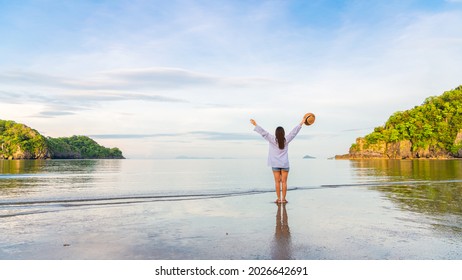 Happy traveler woman joy fun nature scenic landscape sea beach at morning, Freedom leisure tourist girl travel Satun Thailand summer holiday vacation trip, Tourism beautiful destinations place Asia