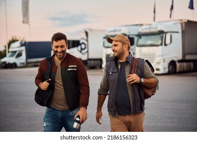 Happy Truck Drivers Talking While Leaving Parking To After Work.