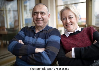Happy Turkish Senior couple at cafe