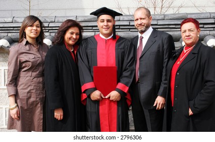 Happy university graduate with his family. - Shutterstock ID 2796306