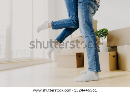 Similar – Image, Stock Photo Unrecognizable woman packing carton box with tape dispenser