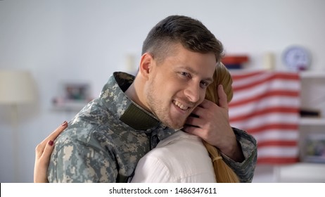 Happy US Soldier Embracing Wife With Love, Homecoming After Military Service