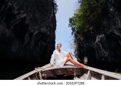 Happy Vacation In Thailand. Pretty Young Woman Sailing On Traditional Longtail Boat.